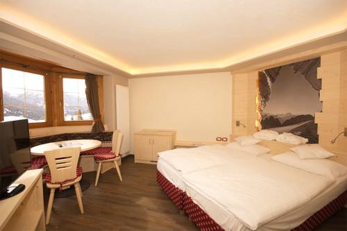 Imagen de la habitación del Hotel Berg Latemar Spitze. Foto 12