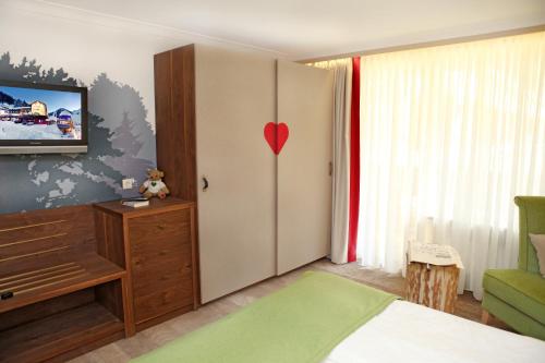 Imagen de la habitación del Hotel Berghotel Hochfügen. Foto 17