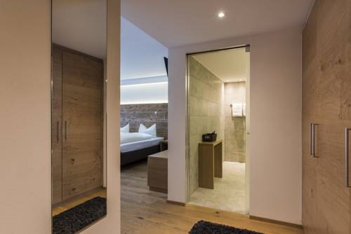 Imagen de la habitación del Hotel Berghotel Tgantieni. Foto 10