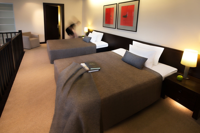 Imagen de la habitación del Hotel Bergs Suites. Foto 5