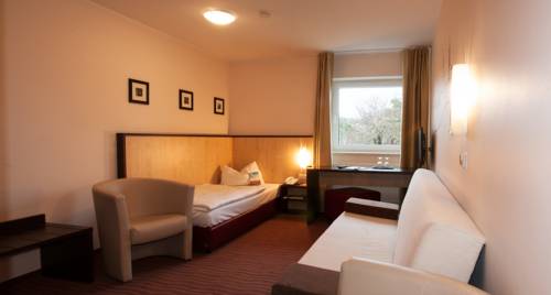 Imagen de la habitación del Hotel Bergwirtschaft Wilder Mann. Foto 3