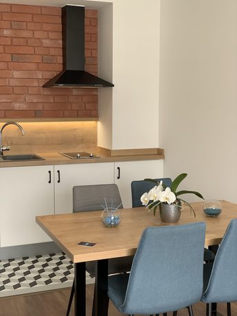 Imagen del bar/restaurante del Hotel Berill Suites. Foto 2