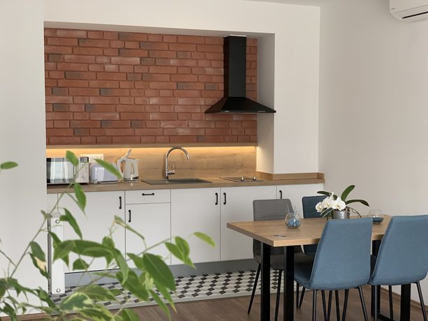 Imagen del bar/restaurante del Hotel Berill Suites. Foto 3