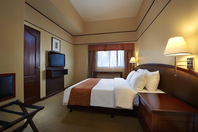 Imagen de la habitación del Hotel Berjaya Makati. Foto 7