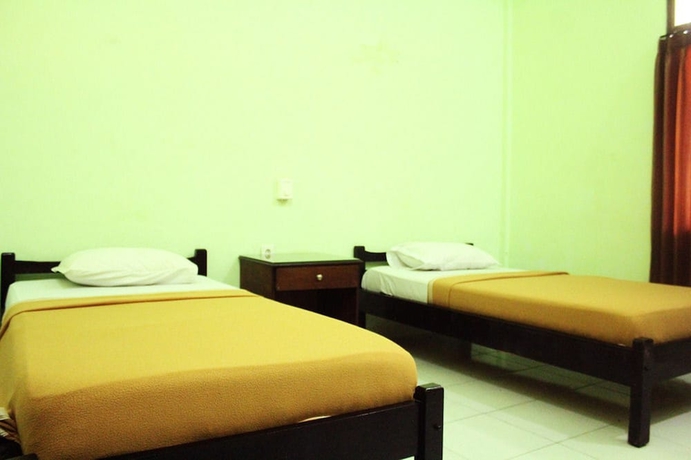 Imagen de la habitación del Hotel Berlian Inn Kuta Beach. Foto 3