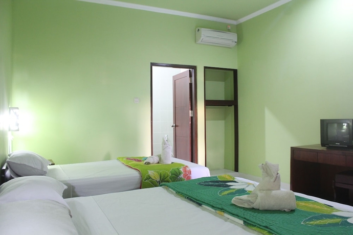 Imagen de la habitación del Hotel Berlian Inn Kuta Beach. Foto 4
