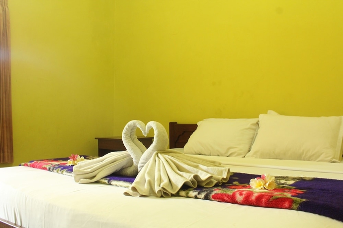 Imagen de la habitación del Hotel Berlian Inn Kuta Beach. Foto 9