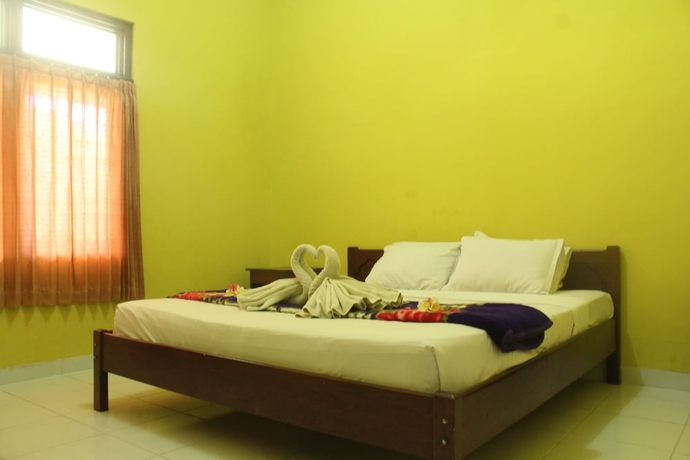 Imagen de la habitación del Hotel Berlian Inn Kuta Beach. Foto 11