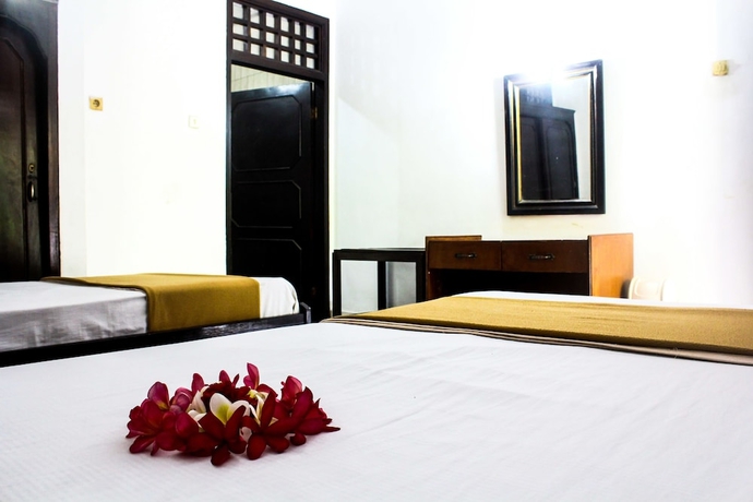 Imagen de la habitación del Hotel Berlian Inn Kuta Beach. Foto 14