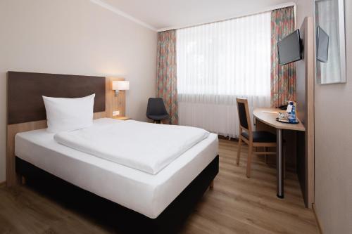 Imagen de la habitación del Hotel Berliner Bär. Foto 4