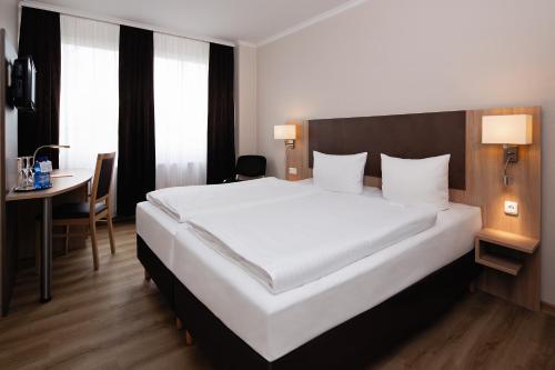 Imagen de la habitación del Hotel Berliner Bär. Foto 5