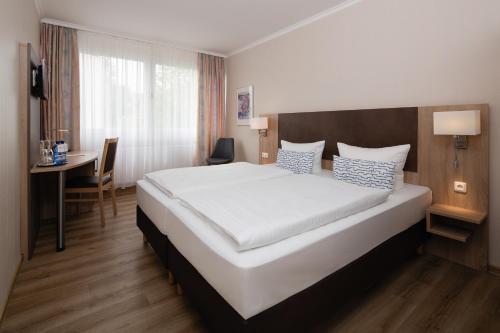 Imagen de la habitación del Hotel Berliner Bär. Foto 6