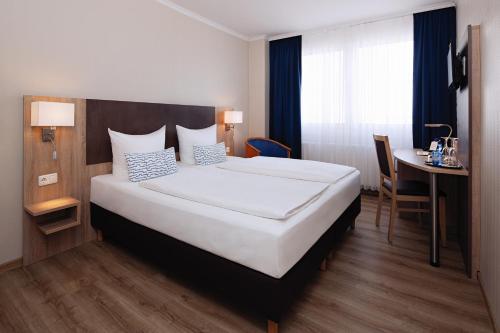 Imagen de la habitación del Hotel Berliner Bär. Foto 8