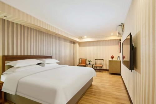 Imagen de la habitación del Hotel Bernard, Zhangpu. Foto 15