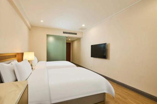 Imagen de la habitación del Hotel Bernard, Zhangpu. Foto 18