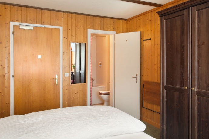 Imagen de la habitación del Hotel Bernerhof Grindelwald. Foto 12