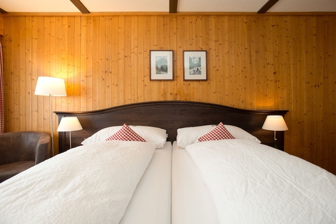 Imagen de la habitación del Hotel Bernerhof Grindelwald. Foto 13