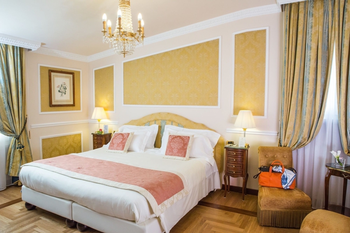 Imagen de la habitación del Hotel Bernini Palace. Foto 9