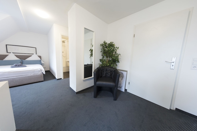 Imagen de la habitación del Hotel Berolina Haus. Foto 12