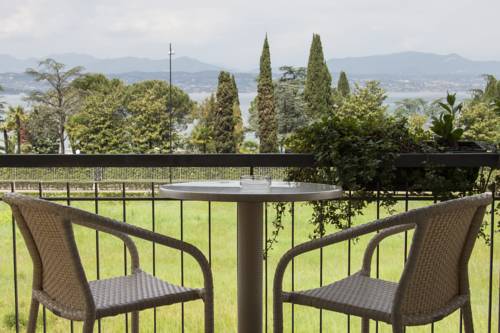 Imagen de la habitación del Hotel Berta, Desenzano del Garda. Foto 6