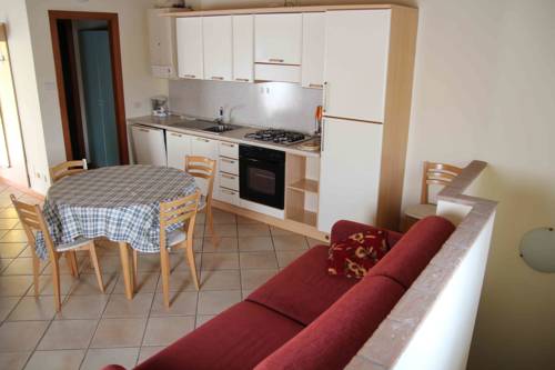 Imagen de la habitación del Hotel Bertoletta Village. Foto 7