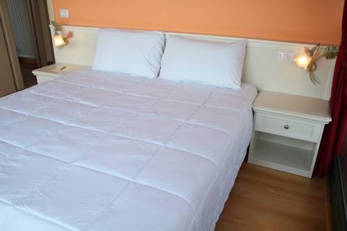 Imagen de la habitación del Hotel Bertoletta Village. Foto 11