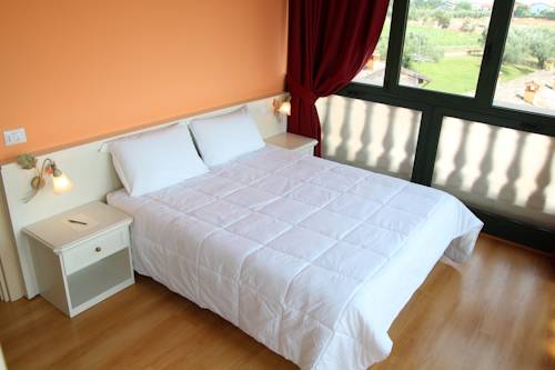 Imagen de la habitación del Hotel Bertoletta Village. Foto 12