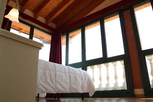 Imagen de la habitación del Hotel Bertoletta Village. Foto 13