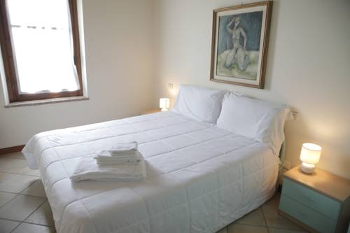 Imagen de la habitación del Hotel Bertoletta Village. Foto 14