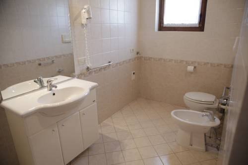 Imagen de la habitación del Hotel Bertoletta Village. Foto 15