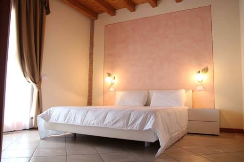 Imagen de la habitación del Hotel Bertoletta Village. Foto 16