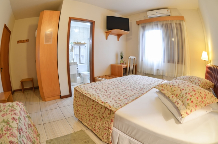 Imagen de la habitación del Hotel Bertoluci. Foto 11