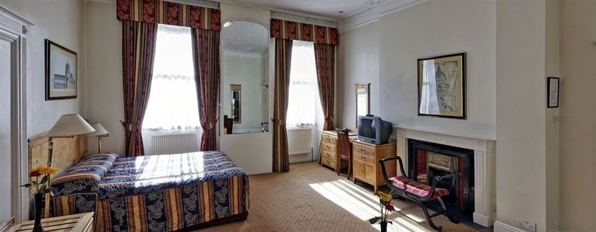 Imagen de la habitación del Hotel Bertrand's Townhouse. Foto 8