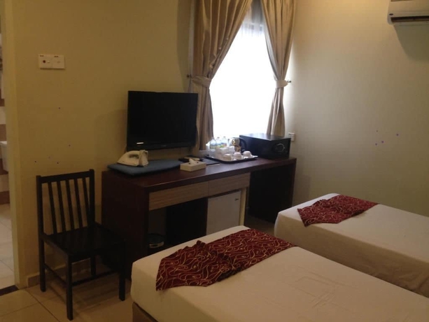 Imagen de la habitación del Hotel Beruang Hill Resort. Foto 13