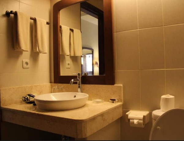 Imagen de la habitación del Hotel Besakih Beach. Foto 4