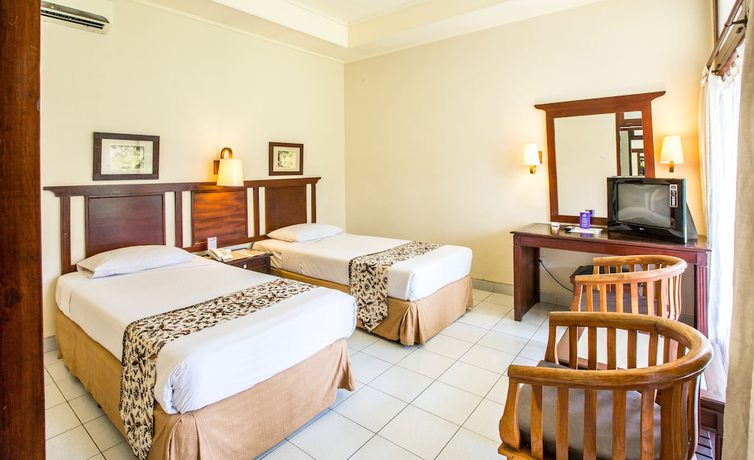 Imagen de la habitación del Hotel Besakih Beach. Foto 12