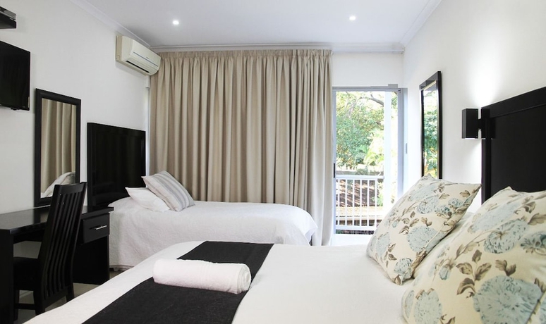 Imagen de la habitación del Hotel Beside Still Waters Boutique. Foto 5