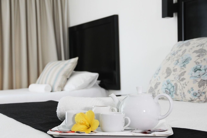 Imagen de la habitación del Hotel Beside Still Waters Boutique. Foto 11