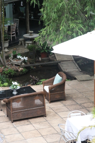 Imagen de la habitación del Hotel Beside Still Waters Boutique. Foto 13