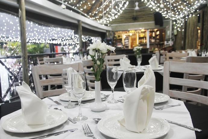 Imagen del bar/restaurante del Hotel Beside Still Waters Boutique. Foto 2