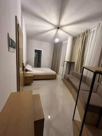 Imagen de la habitación del Hotel Besimi Apartments. Foto 18