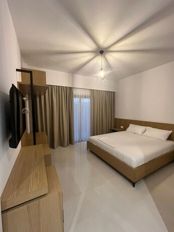 Imagen de la habitación del Hotel Besimi Apartments. Foto 19