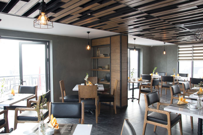 Imagen del bar/restaurante del Hotel Bespoke Trendy Hotel Hanoi. Foto 11