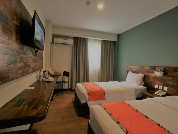 Imagen de la habitación del Hotel Best City, Jogjakarta. Foto 8