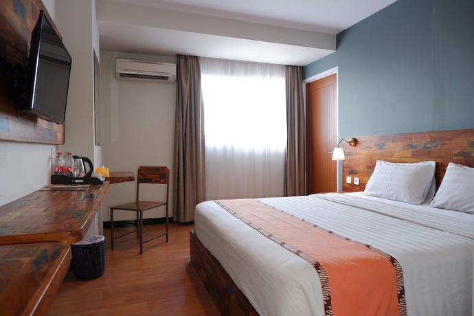 Imagen de la habitación del Hotel Best City, Jogjakarta. Foto 11