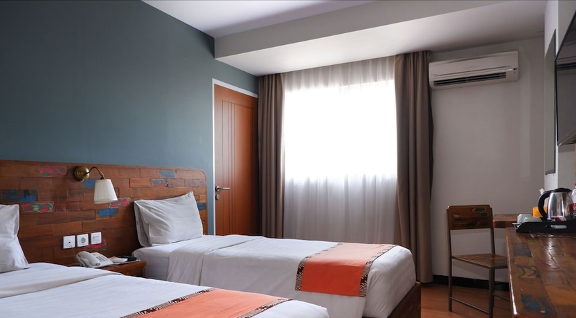 Imagen de la habitación del Hotel Best City, Jogjakarta. Foto 12