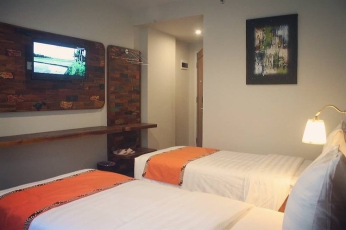 Imagen de la habitación del Hotel Best City, Jogjakarta. Foto 13