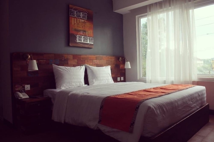 Imagen de la habitación del Hotel Best City, Jogjakarta. Foto 14