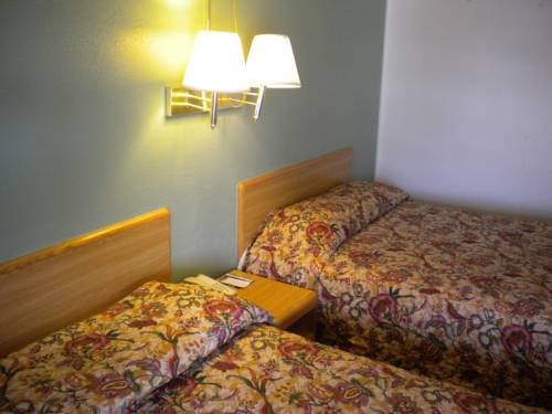 Imagen de la habitación del Hotel Best Economy Inn N Suites. Foto 3