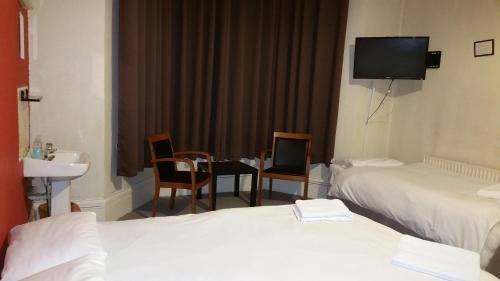 Imagen de la habitación del Hotel Best Inn, Ilford. Foto 7